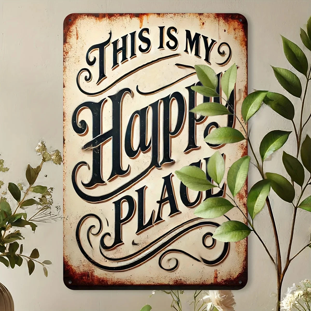 A rustic iron wall sign with carved text that reads This Is My Happy Place, mounted on a light-colored wall.