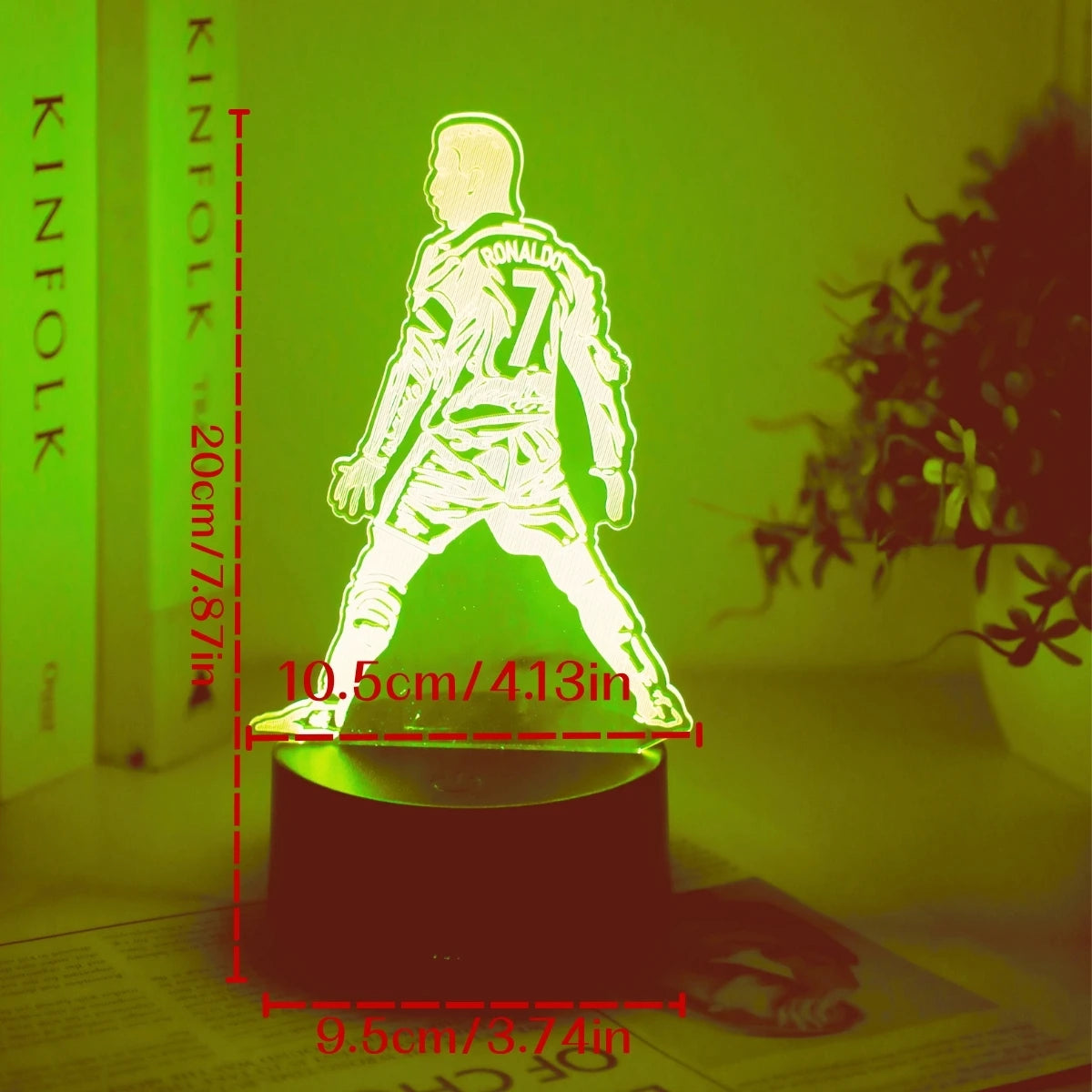 A glowing 3D football player figure illuminates a dark surface, showing a cycle of seven colors.