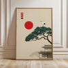 A vertical canvas print featuring a silhouette of a pine tree, a red sun, and Japanese calligraphy on a beige background.