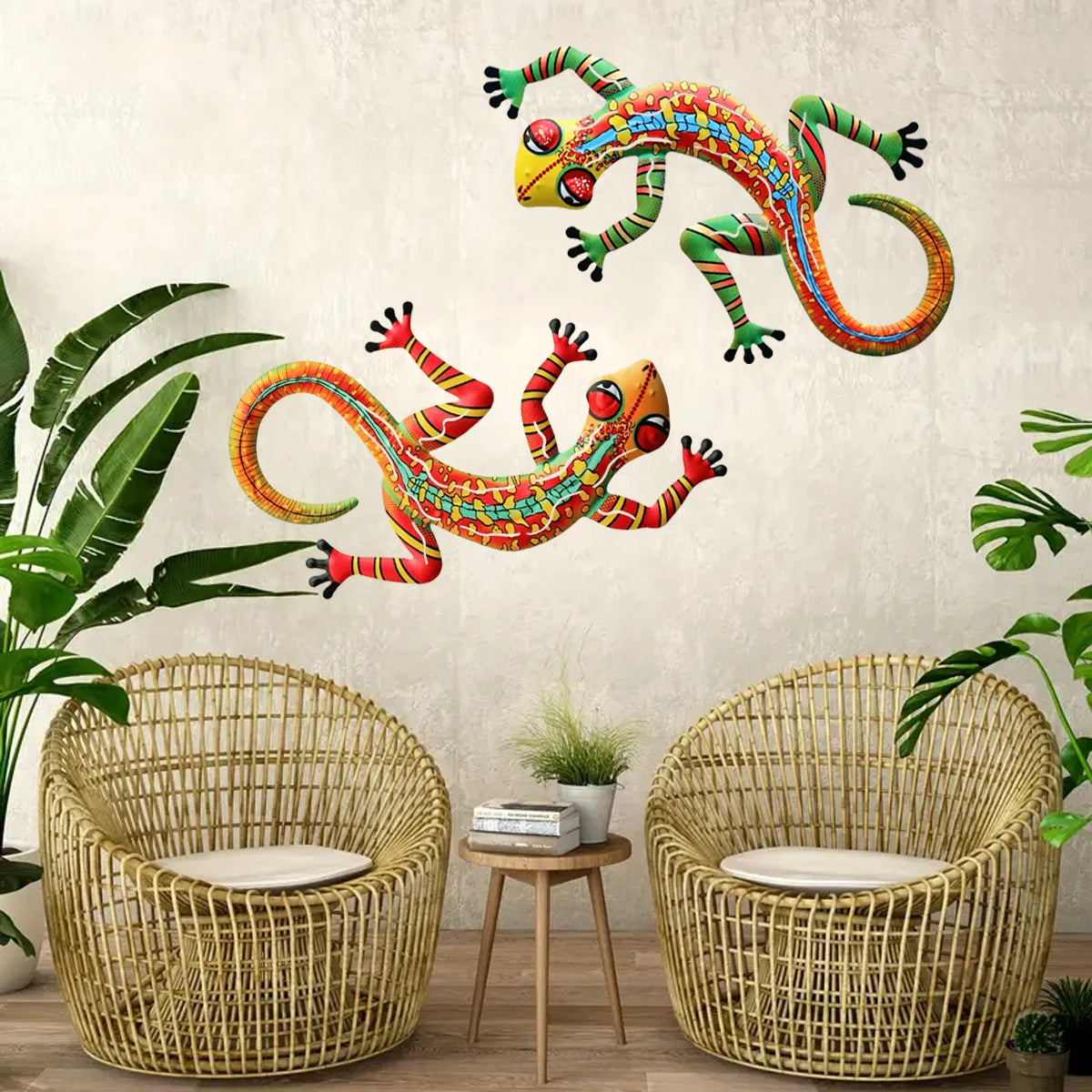 Handcrafted metal gecko wall art featuring colorful lizards displayed above two wicker chairs.