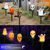 Un ensemble de lumières piquets d'Halloween à énergie solaire avec des motifs de citrouille et de crâne pour la décoration de