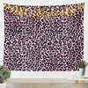 A vibrant leopard print tapestry wall hanging featuring black and pink wild animal pattern decor.