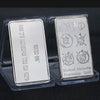 A silver bullion bar replica featuring Greek letters and a scholarship inscription on a clear plastic holder.