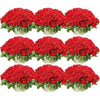 A bouquet of vibrant red artificial silk roses arranged for table decor.