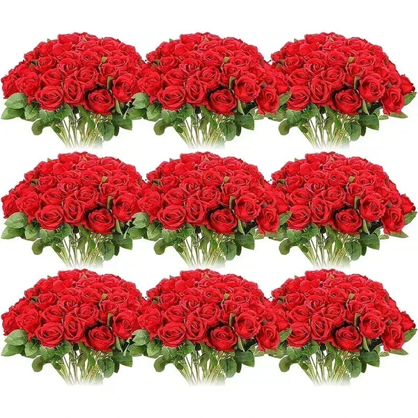 A bouquet of vibrant red artificial silk roses arranged for table decor.