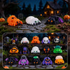 A collection of mini creepy-cute monster spider and skeleton figurines in various colors like orange, purple, black, and whit