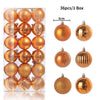 A box containing 36 gold and bronze glitter Christmas tree ornament balls.