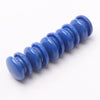 A line of ten bright blue refrigerator magnets arranged in a row.