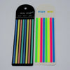 A set of transparent sticky notes and index tabs in various bright colors, packaged in a black and white grid.
