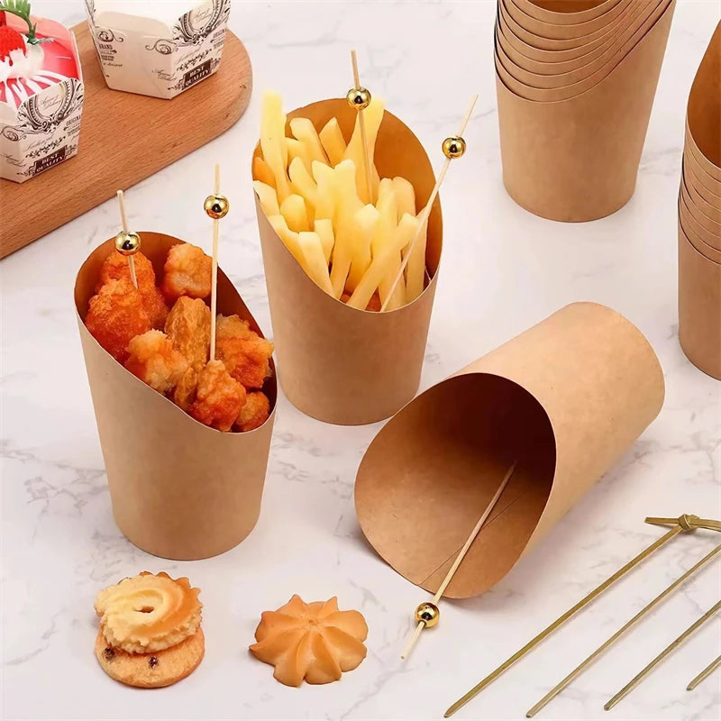 A collection of disposable kraft paper cups used for serving french fries and other snacks.