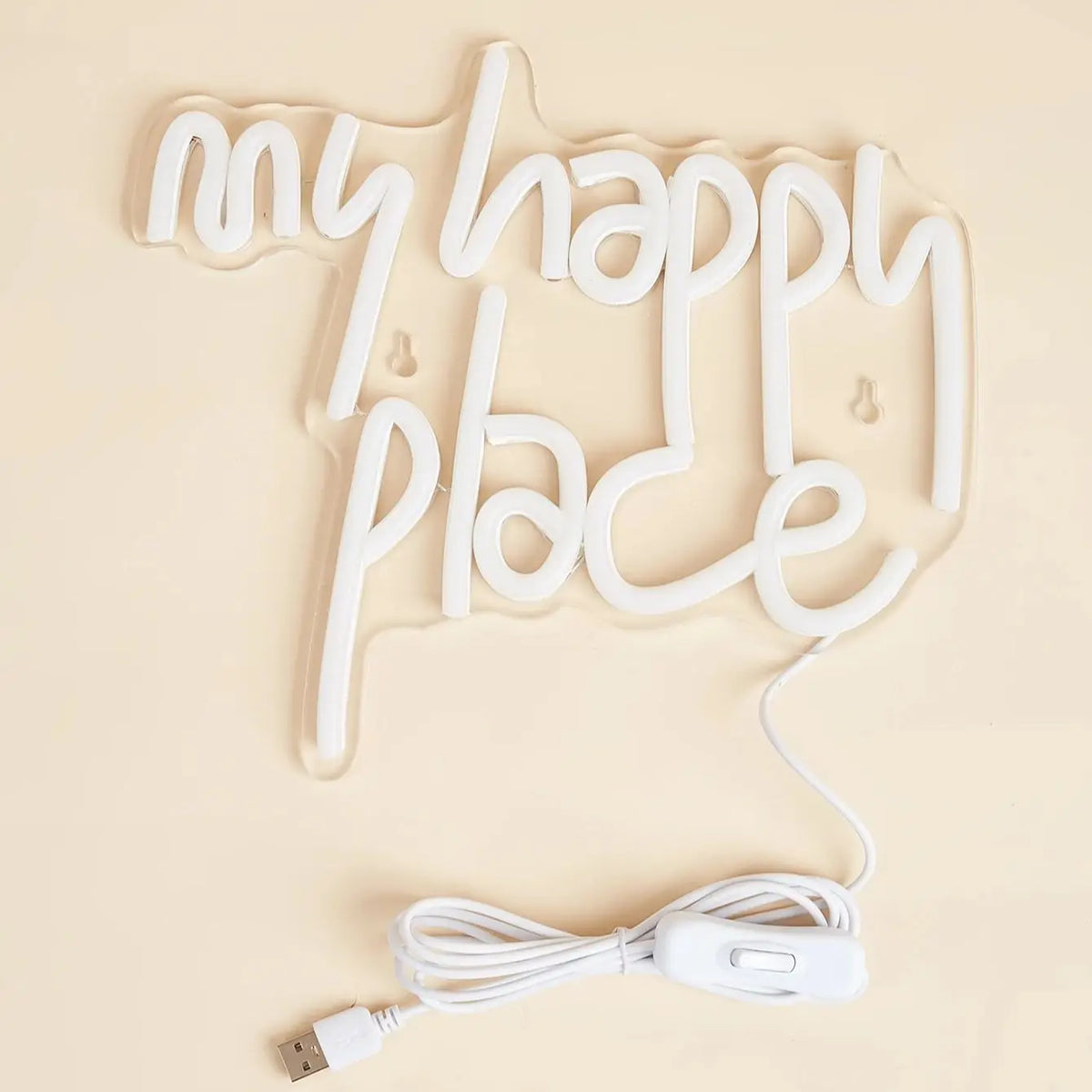 A white LED neon sign shaped like the words my happy place, featuring a USB power cord.