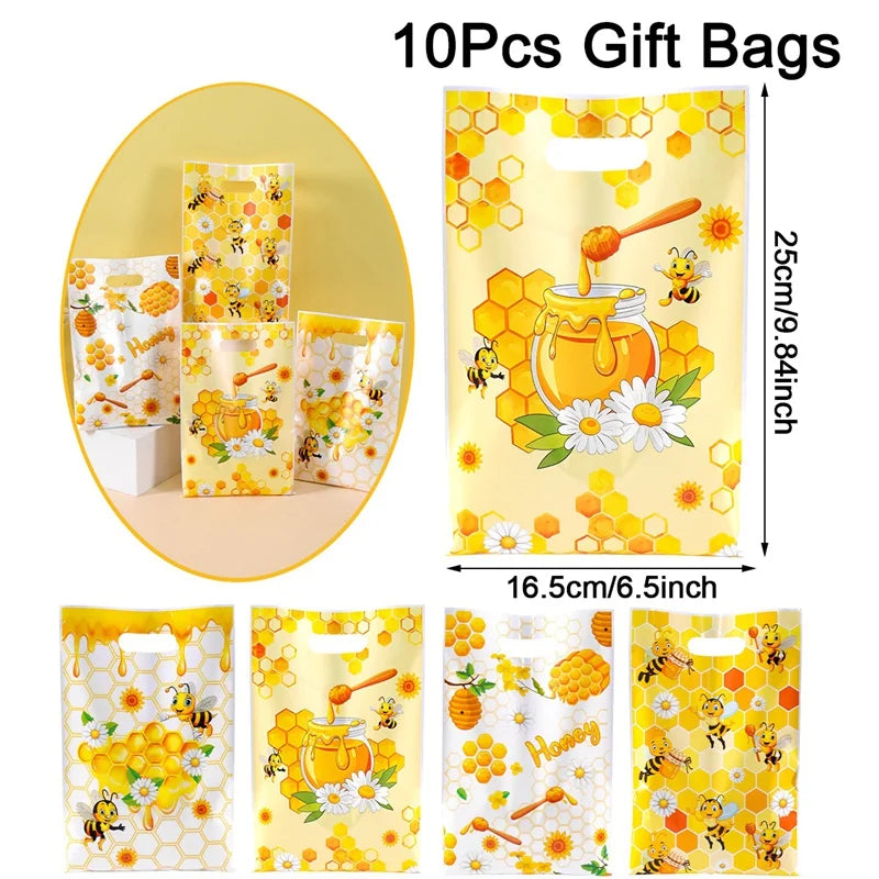 Ten packs of yellow and orange bee honey gift bags with handles for party favors