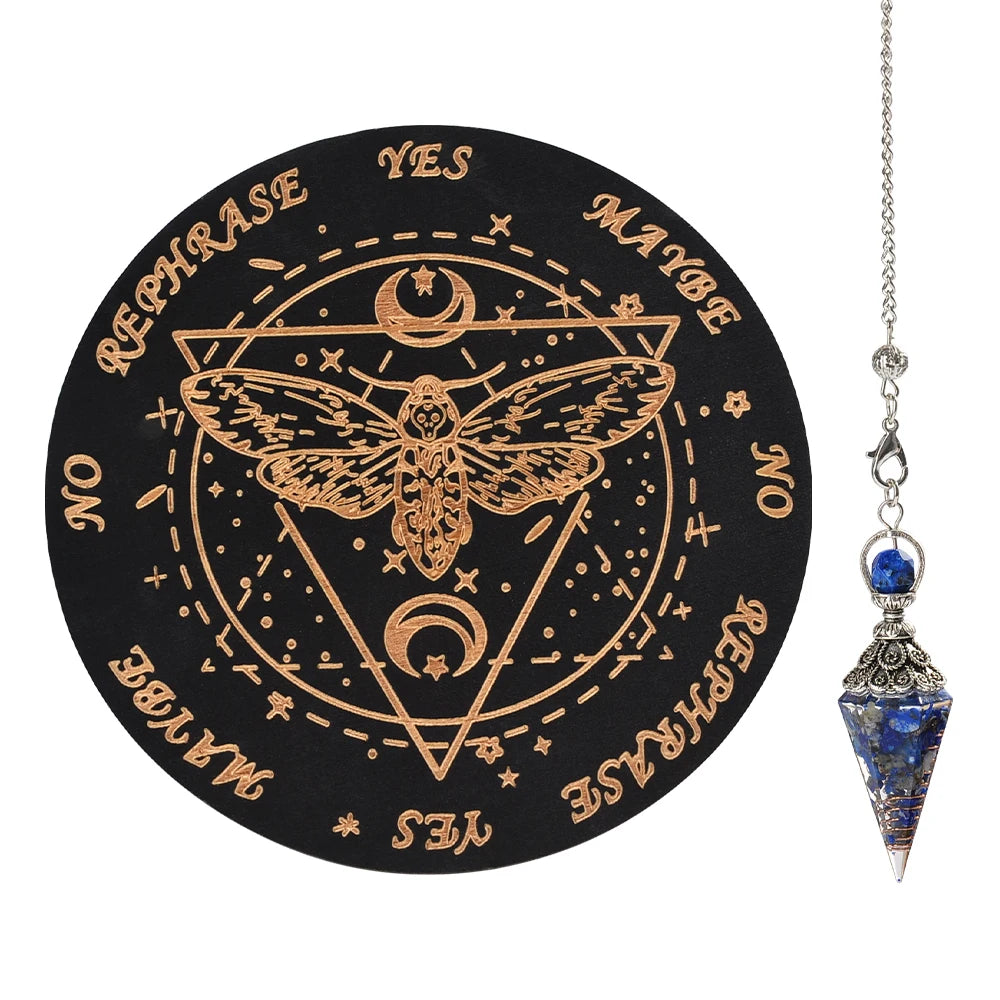 A black wooden pendulum board featuring a geometric design and an inlaid rose quartz crystal necklace on a silver chain.