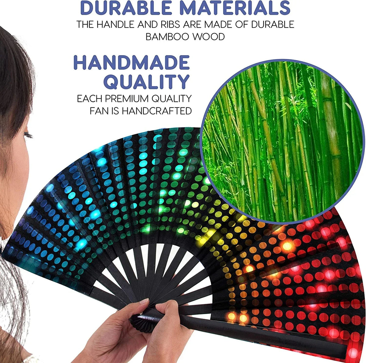 A hand is holding an open folding bamboo fan with colorful lights, showing the durable wood and handcrafted quality.