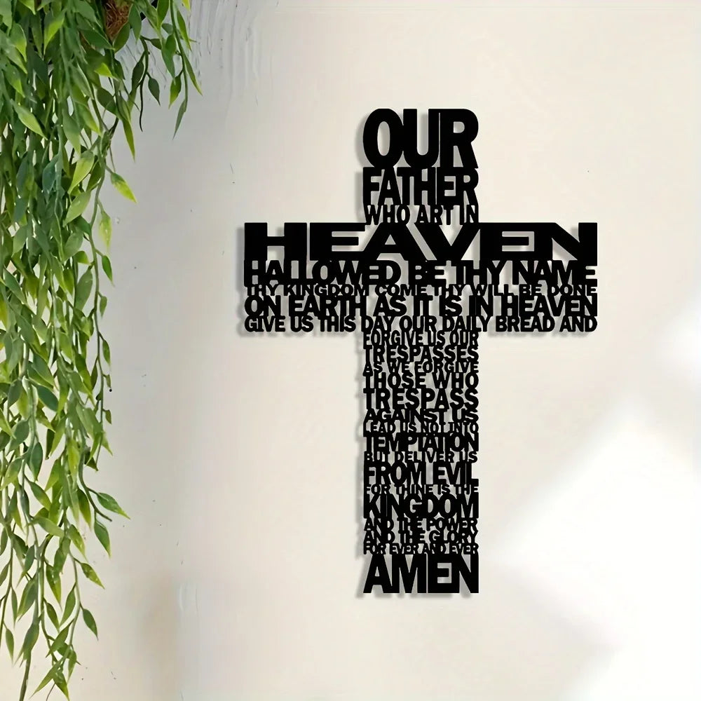 Black metal cross wall art with the inscription Our Father Who Art In Heaven