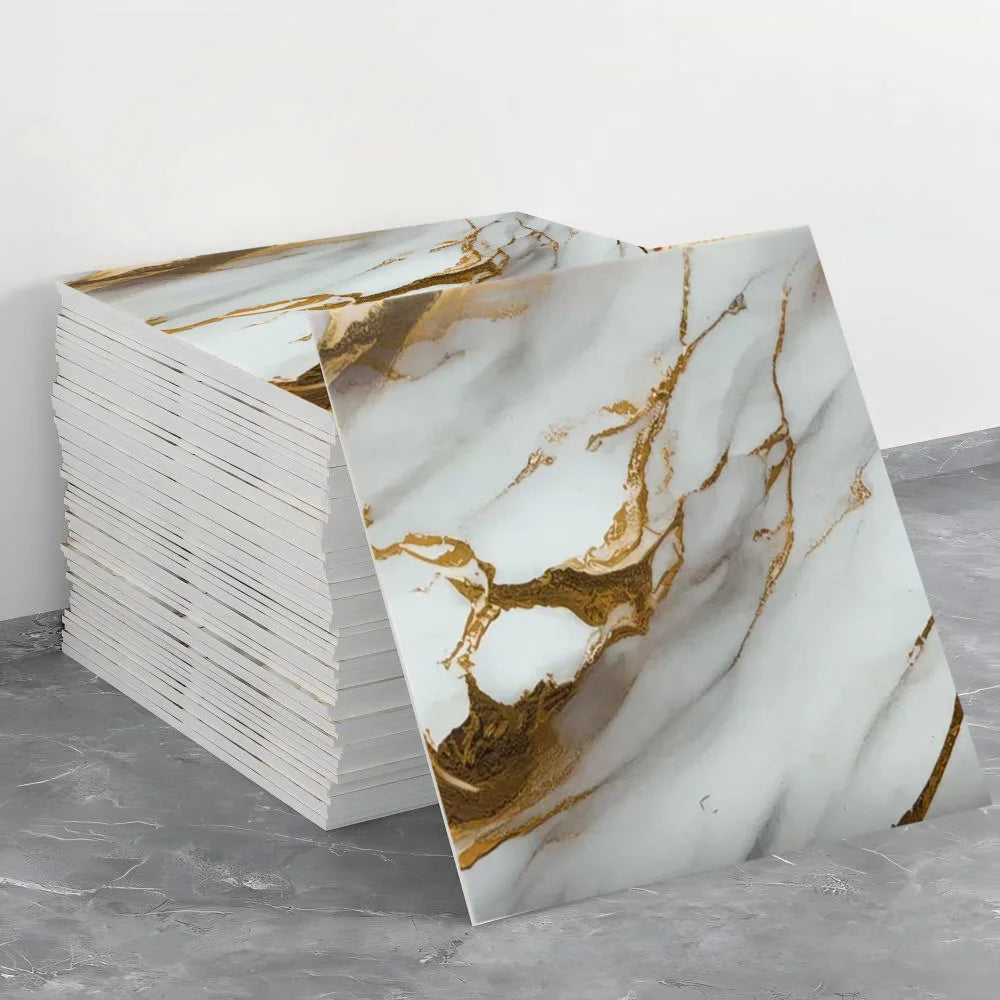 A stack of self-adhesive marble tile stickers featuring gold veining on a white background.