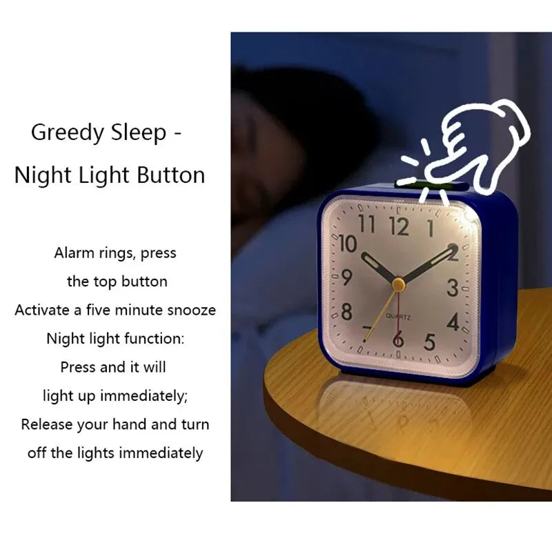 A blue digital alarm clock with a night light feature is shown on a wooden surface.
