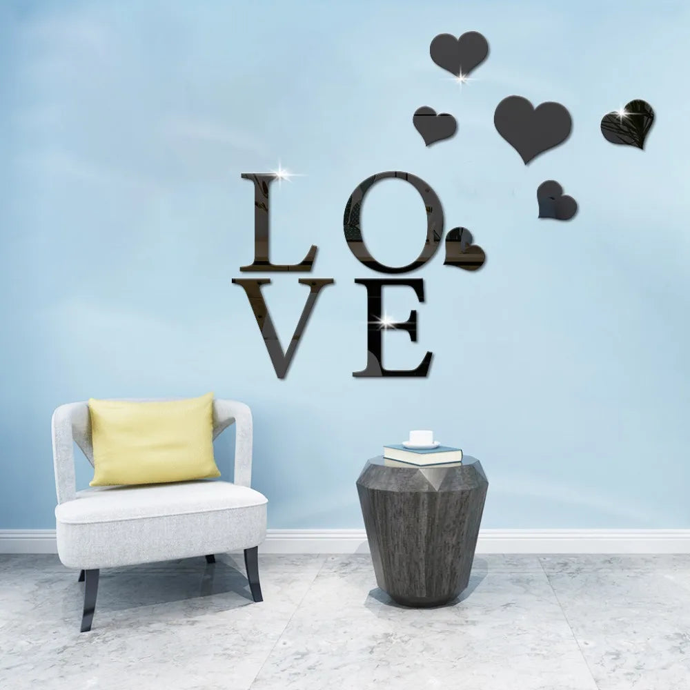 A light blue wall features large 3D acrylic heart stickers spelling out LOVE with a mirror finish