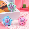 Three small, round guessing game eggs in teal, blue, and pink with handprints and flowers.