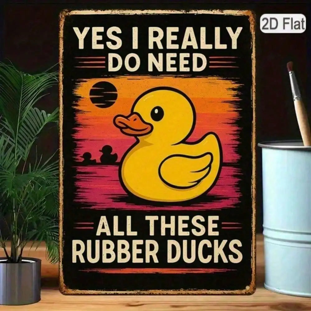 A vertical black wall sign featuring a yellow rubber duck silhouette against an orange sunset background with text reading Ye