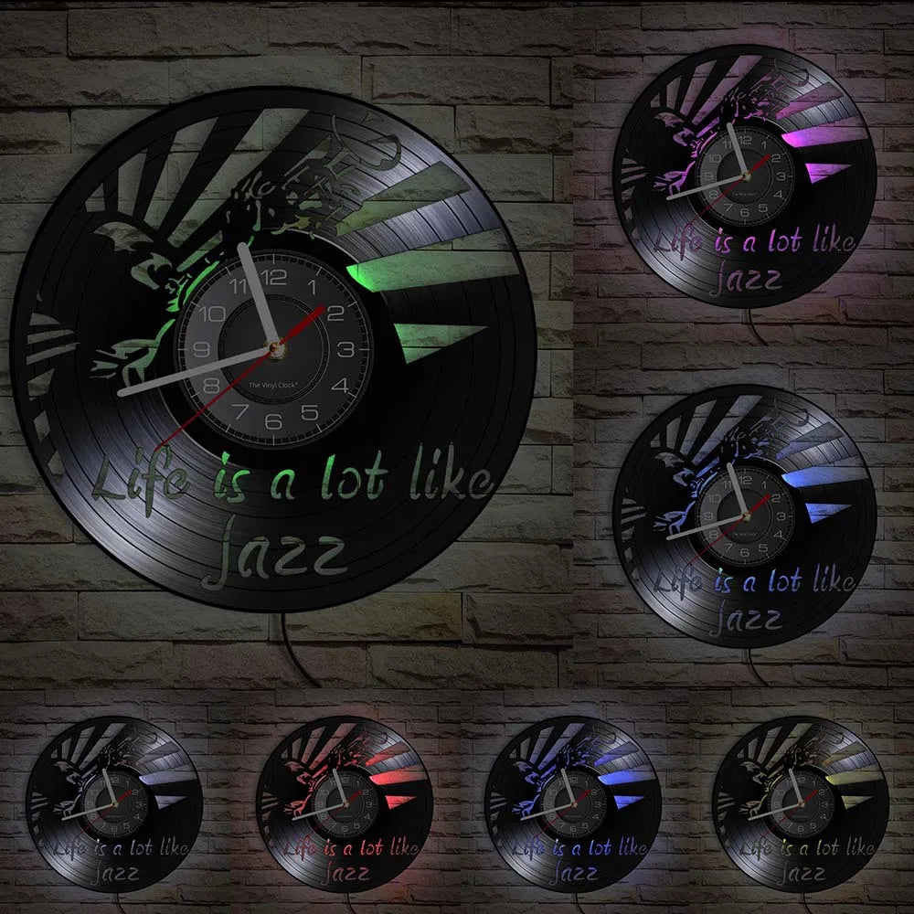 A collection of vintage vinyl record wall clocks featuring the text Life is a lot like Jazz on black backgrounds.