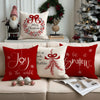 Red Christmas cushion covers featuring a bow and wreath design with Merry Christmas and Joy to the world text