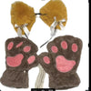 Pair of brown fuzzy cat paw gloves with pink pads and decorative white ribbons.