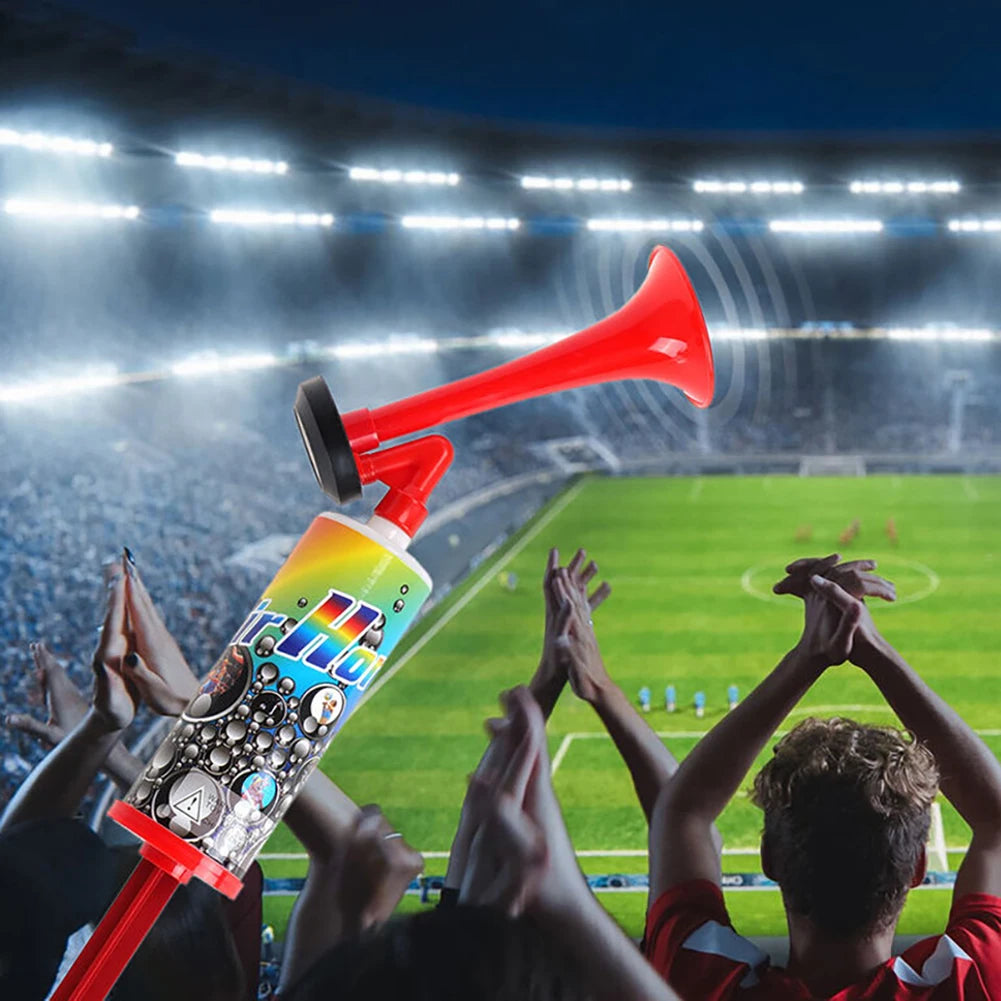 A red air pressure horn is held up by a crowd during a sports event celebration.