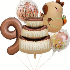 A set of foil balloons featuring a capybara cartoon character for birthday parties