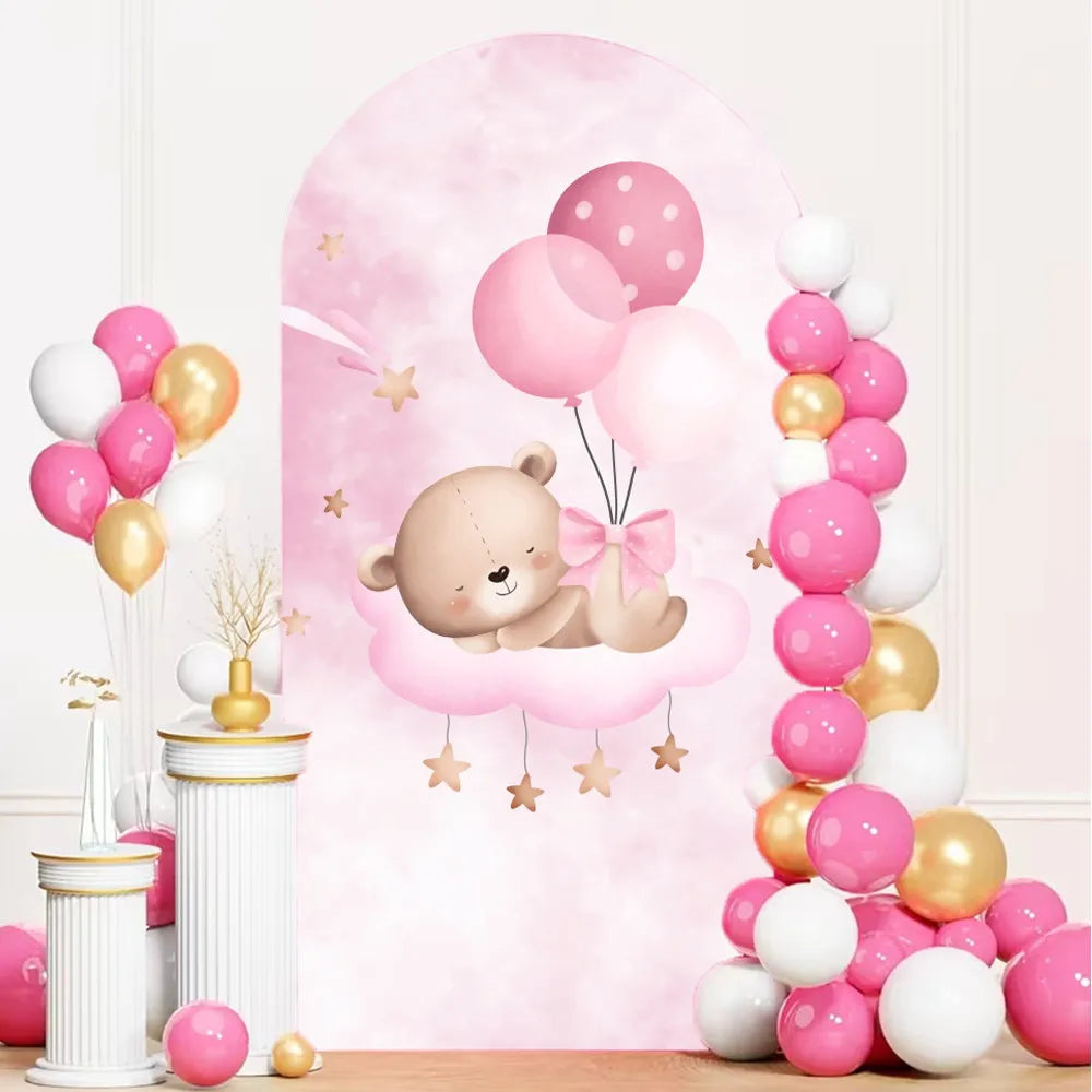 Pink and white balloons and a cute teddy bear on a cloud backdrop for baby shower decor
