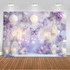 A dreamy purple photo backdrop featuring soft lighting, large butterflies, and purple floral elements for events.