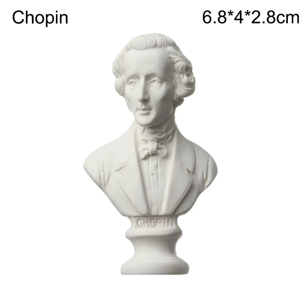 A white plaster bust miniature of a classical figure, used for art practice or home decor.