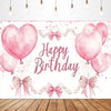 Pink heart balloons and bows create a festive birthday backdrop for girls