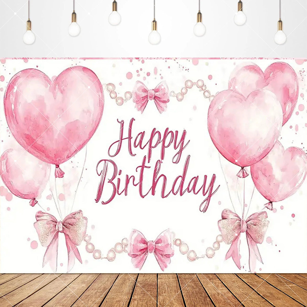 Pink heart balloons and bows create a festive birthday backdrop for girls