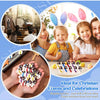 A hand holds a cluster of mini rubber Jesus figurines for Easter and religious gifting.