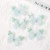 Light blue translucent butterfly patches with silver embroidery on white lace fabric