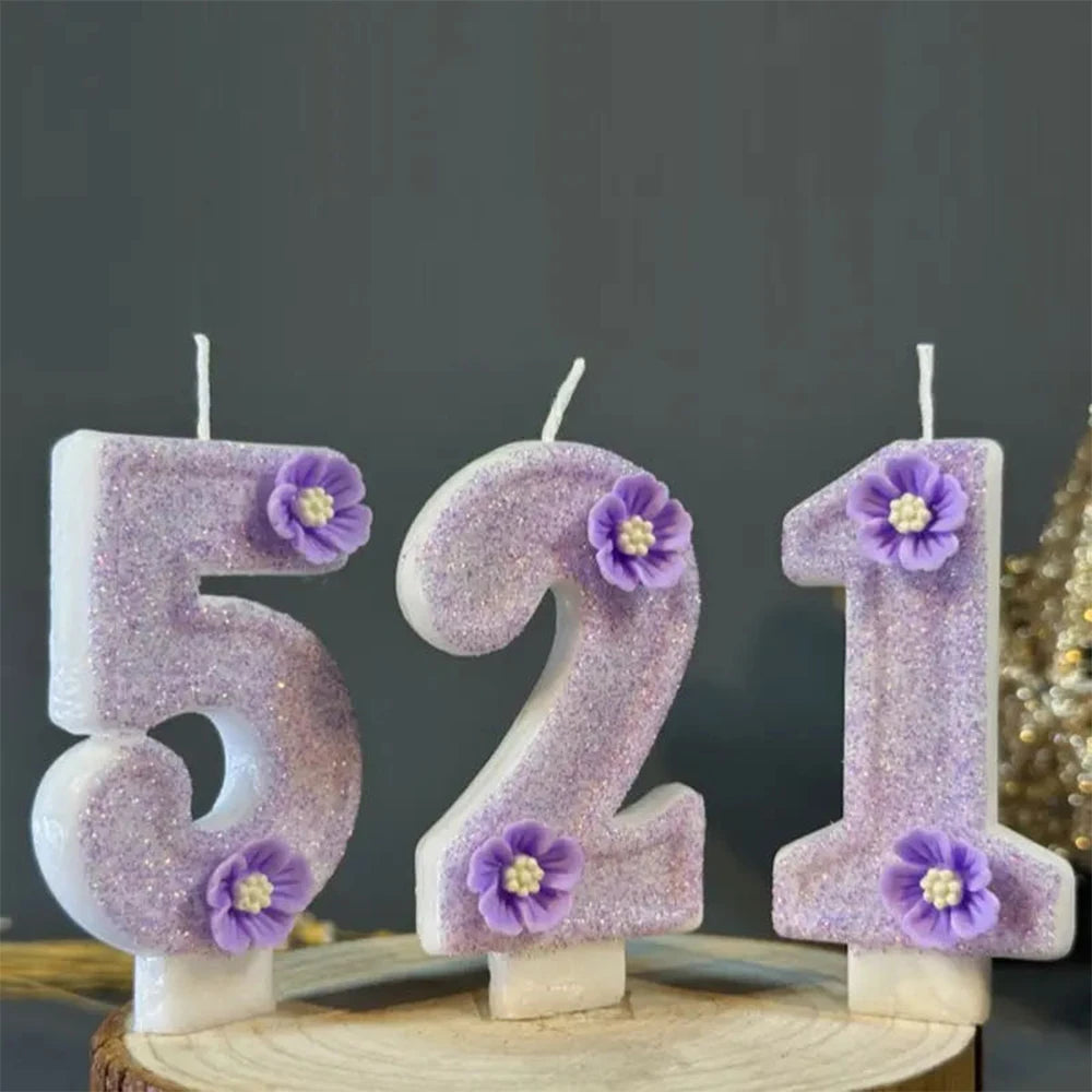 Purple sparkling number candles forming the number 521 for a birthday cake decoration