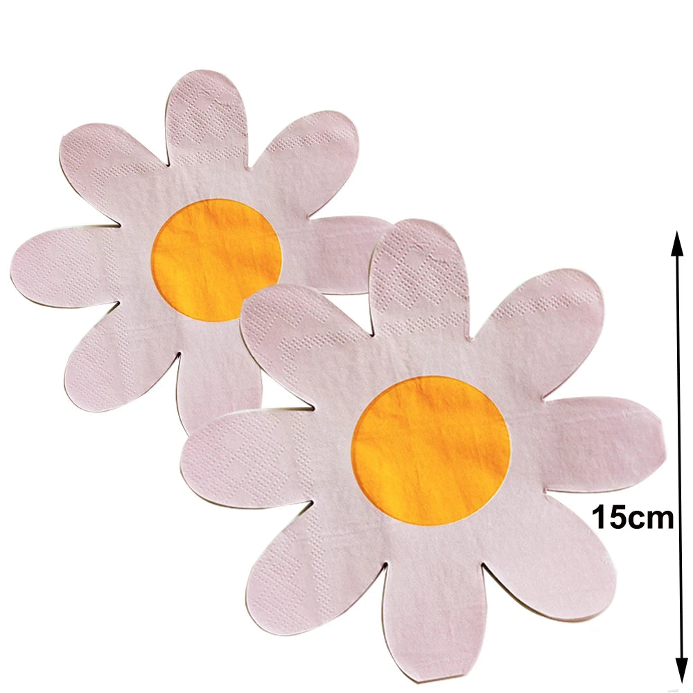 Pink disposable daisy flower napkins with orange centers shown against a white background.
