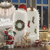 Una exhibición navideña con un arco de fondo elástico blanco decorado con luces, guirnaldas y regalos.