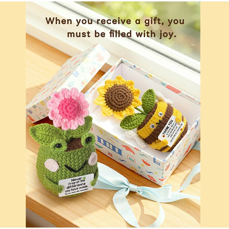 Hand crocheted sunflower bee potted ornaments in a gift box with a joyful message