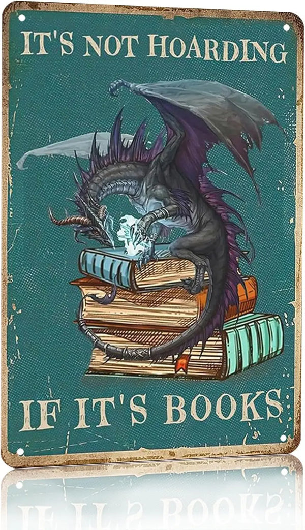 Vintage tin sign featuring a dark dragon perched on a stack of old books with the text It's Not Hoarding If It's Books