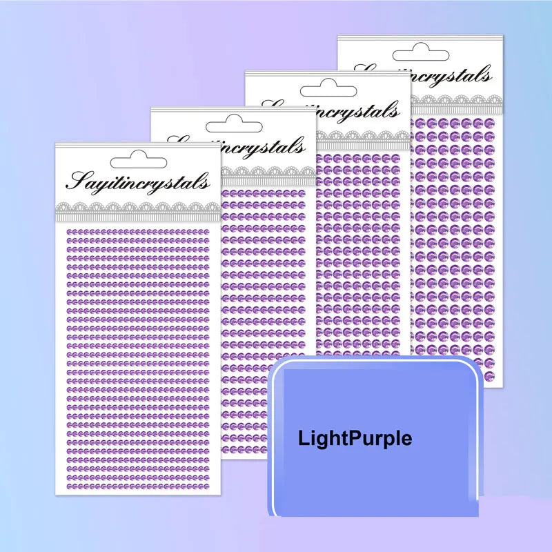 A collection of Light Purple self-adhesive rhinestone embellishments in various sizes and shapes.