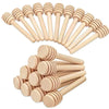 A set of ten natural wood honey dipper sticks arranged in a fan shape.