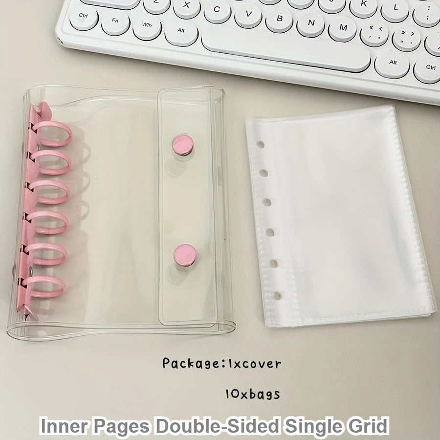 A clear plastic binder cover and a white sheet protector with multiple pink rings for organizing collectibles