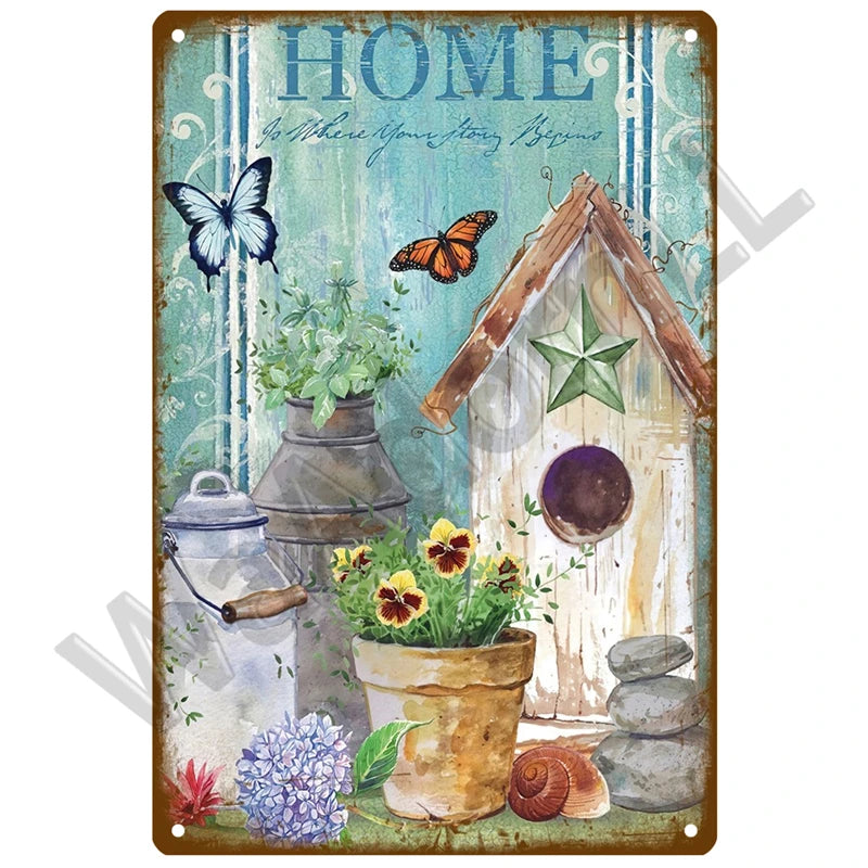 A vintage metal sign featuring a watercolor illustration of a house with a star, flowers, and butterflies on a teal backgroun