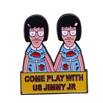 Enamel pin badge featuring two cartoon characters with black hair and glasses, with the text Come Play With Us Jimmy Jr