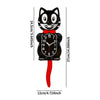 A black cartoon cat wall clock with a swinging red tail, showing the time.