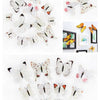 A collection of twelve white and pink butterflies in various shades and sizes used as decorative wall stickers.