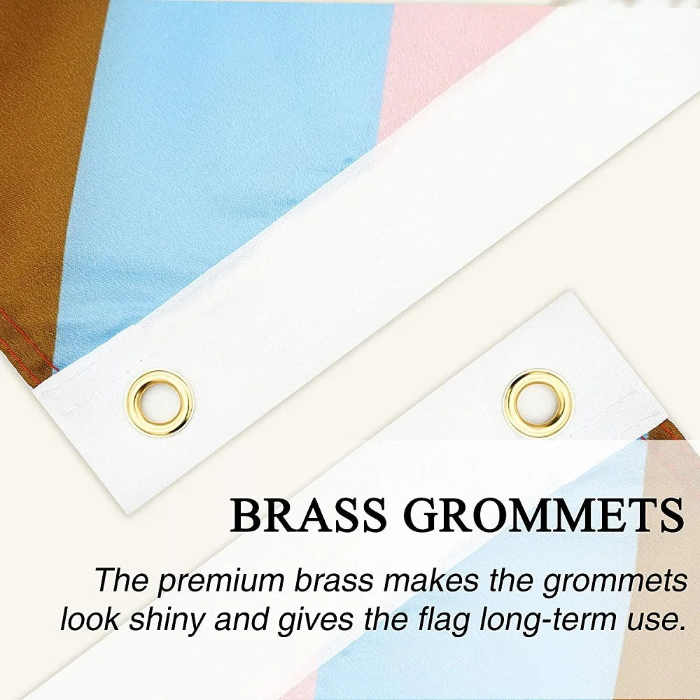 Brass grommets on a white flag banner with colored fabric sections.