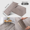A package of wood grain peel-and-stick floor and wall stickers in a gray finish, showing the product size and texture.